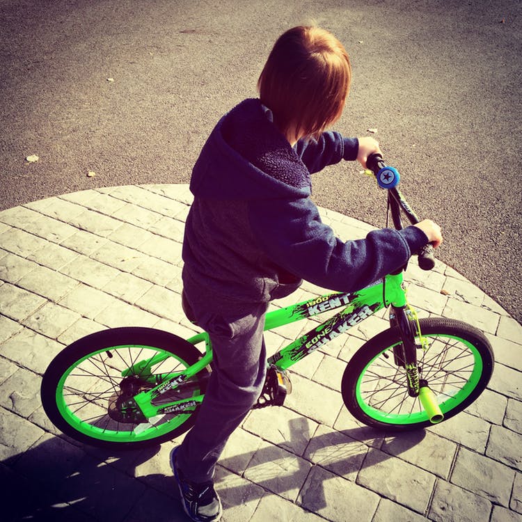 kid on bicycle